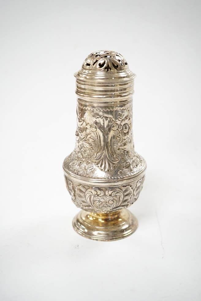 A George II silver sugar castor, with later embossed decoration, Jabez Daniell?, London, 1751, 12.8cm, cover unmarked, 4oz. Condition - fair